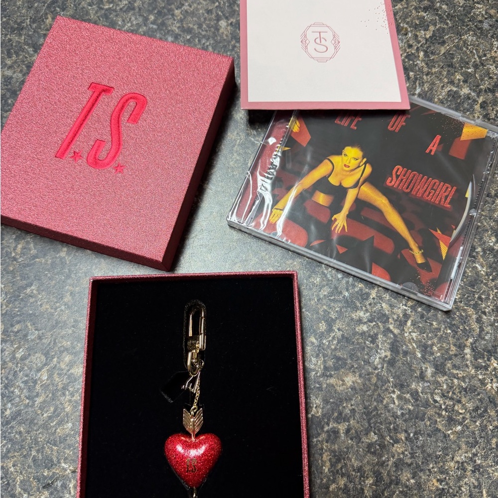 Life of a showgirl deluxe cd- opened. Comes with everything.